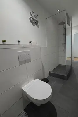 Ein Badezimmer in der Unterkunft H&H Duisburg