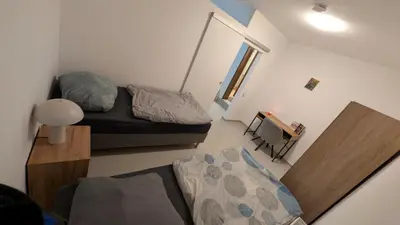 Ein Bett oder Betten in einem Zimmer der Unterkunft Marco Compact City Flat