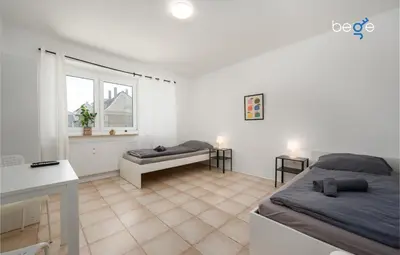 Ein Bett oder Betten in einem Zimmer der Unterkunft BEGE APARTMENTS ProStay