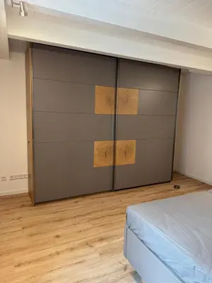 Ein Bett oder Betten in einem Zimmer der Unterkunft Ferienwohnungen am Markt