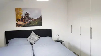 Ein Bett oder Betten in einem Zimmer der Unterkunft Das Steigerhaus in Mülheim an der Ruhr