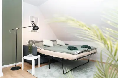 Ein Bett oder Betten in einem Zimmer der Unterkunft DAS GRÜNE NEST Münsterland Living