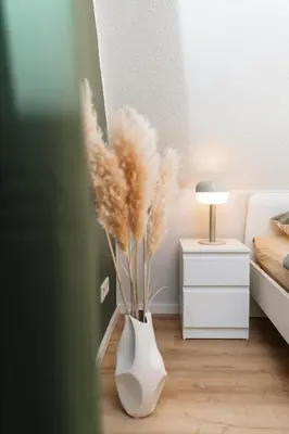 Ein Bett oder Betten in einem Zimmer der Unterkunft DAS GRÜNE NEST Münsterland Living