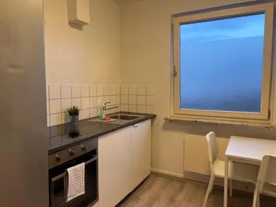 Küche/Küchenzeile in der Unterkunft T&K Apartments - Herne - 2 Zimmer Wohnungen - Vollausgestattet