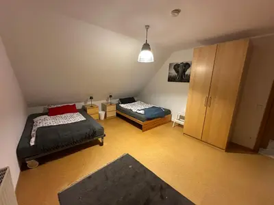 Ein Bett oder Betten in einem Zimmer der Unterkunft FeWo Rodopo - Wohlfühlen im Grünen