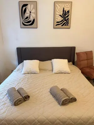 Ein Bett oder Betten in einem Zimmer der Unterkunft Helios City Room