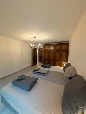 Ein Bett oder Betten in einem Zimmer der Unterkunft Johanna City Apartment - 150 m2 - 13 Guests