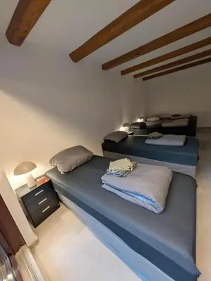 Ein Bett oder Betten in einem Zimmer der Unterkunft Johanna City Apartment - 150 m2 - 13 Guests