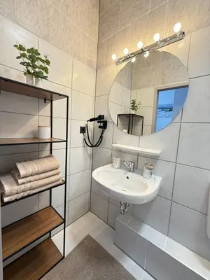 Ein Badezimmer in der Unterkunft Time Wohnung