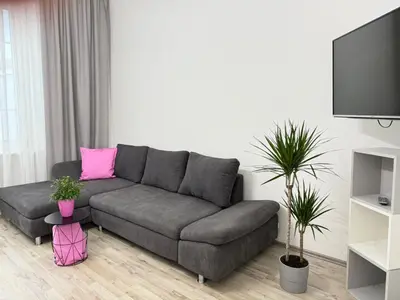 Ein Sitzbereich in der Unterkunft Time Wohnung