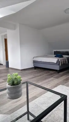 Ein Bett oder Betten in einem Zimmer der Unterkunft MaxMir - Ortlohn Apartment