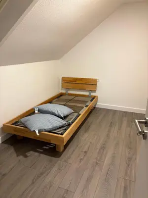 Ein Bett oder Betten in einem Zimmer der Unterkunft Red Dot Apartment Bruno