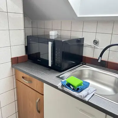 Küche/Küchenzeile in der Unterkunft Red Dot Apartment Bruno