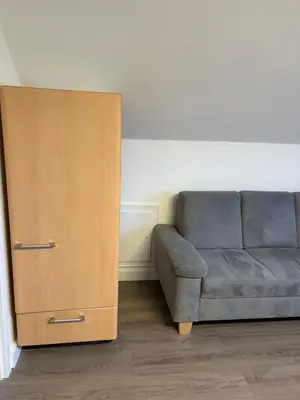 Ein Sitzbereich in der Unterkunft Red Dot Apartment Bruno