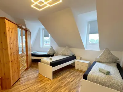 Ein Bett oder Betten in einem Zimmer der Unterkunft Cozy Apartment in Herne