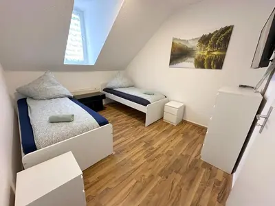 Ein Bett oder Betten in einem Zimmer der Unterkunft Cozy Apartment in Herne