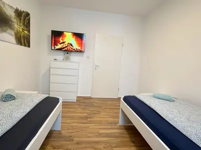Ein Bett oder Betten in einem Zimmer der Unterkunft Cozy Apartment in Herne