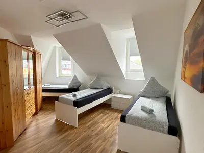 Ein Bett oder Betten in einem Zimmer der Unterkunft Cozy Apartment in Herne