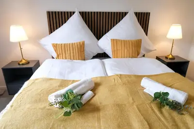 Ein Bett oder Betten in einem Zimmer der Unterkunft Deluxe House mit Terrasse & Garten - Komfort & Raum