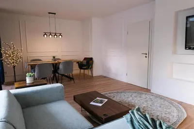 Ein Sitzbereich in der Unterkunft Deluxe House mit Terrasse & Garten - Komfort & Raum