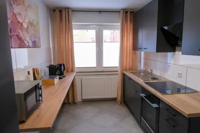 Küche/Küchenzeile in der Unterkunft Deluxe House mit Terrasse & Garten - Komfort & Raum