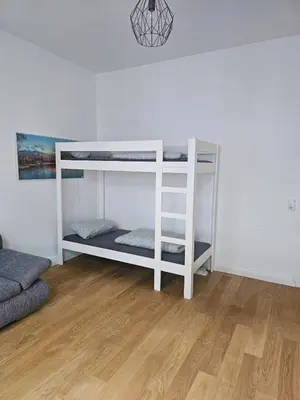 Ein Bett oder Betten in einem Zimmer der Unterkunft Hulda Wohnung