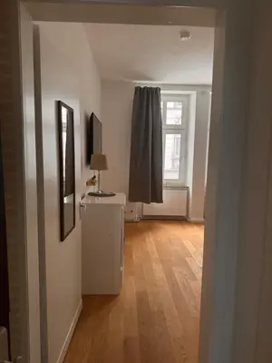 Ein Bett oder Betten in einem Zimmer der Unterkunft Hulda Wohnung