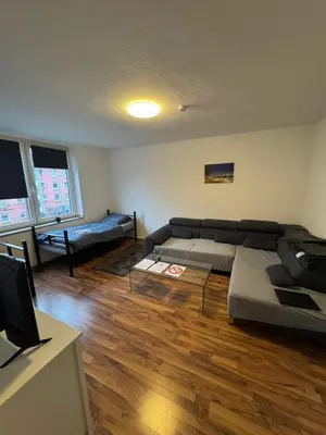 Ein Bett oder Betten in einem Zimmer der Unterkunft Schönes Apartment Nähe Arena auf Schalke