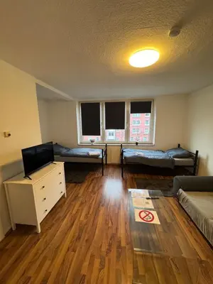 Ein Bett oder Betten in einem Zimmer der Unterkunft Schönes Apartment Nähe Arena auf Schalke