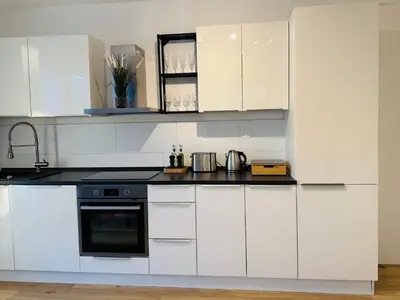 Küche/Küchenzeile in der Unterkunft Charmantes Apartment mit Balkon - Küche - SmartTV