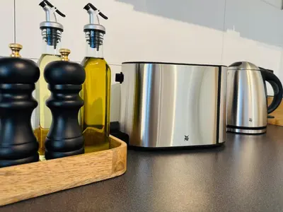 Kaffee-/Teezubehör in der Unterkunft Charmantes Apartment mit Balkon - Küche - SmartTV