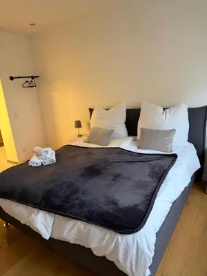Ein Bett oder Betten in einem Zimmer der Unterkunft Auszeit am Heidter Berg City und Natur nah mit Stellplatz und Sauna