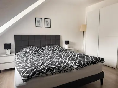 Ein Bett oder Betten in einem Zimmer der Unterkunft Gemütliche Wohnung über den Dächern von Gevelsberg