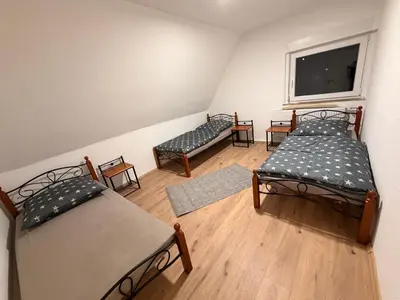Ein Bett oder Betten in einem Zimmer der Unterkunft Workhome A2 zu 6