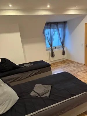 Ein Bett oder Betten in einem Zimmer der Unterkunft Praktische Monteurwohnung 2 Marl