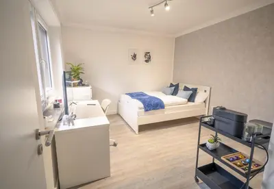 Ein Bett oder Betten in einem Zimmer der Unterkunft FÜR 2, Küche, Kaffeemaschine, Smart TV