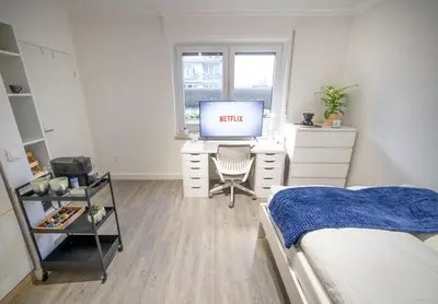 Ein Bett oder Betten in einem Zimmer der Unterkunft FÜR 2, Küche, Kaffeemaschine, Smart TV