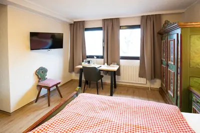 Ein Bett oder Betten in einem Zimmer der Unterkunft Landhotel-Restaurant Beckmann