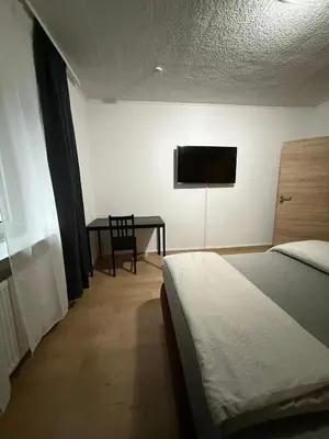 Ein Bett oder Betten in einem Zimmer der Unterkunft Günstige, zentrale und schöne Wohnung in Wuppertal