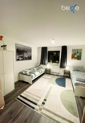 Ein Bett oder Betten in einem Zimmer der Unterkunft BEGE APARTMENTS ClearDesk