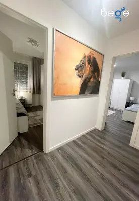 Ein Bett oder Betten in einem Zimmer der Unterkunft BEGE APARTMENTS ClearDesk