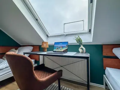 Ein Bett oder Betten in einem Zimmer der Unterkunft Modernes 2-Schlafzimmer City Apartment mit Arbeitsplatz