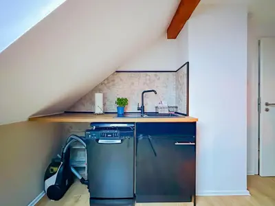 Küche/Küchenzeile in der Unterkunft Modernes 2-Schlafzimmer City Apartment mit Arbeitsplatz