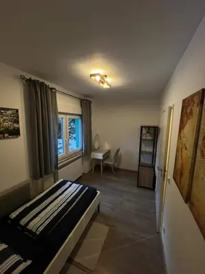 Ein Bett oder Betten in einem Zimmer der Unterkunft Quiet Private Room for Business Travelers - Cologne-Düsseldorf Area