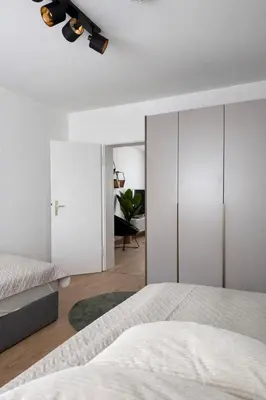 Ein Bett oder Betten in einem Zimmer der Unterkunft Holiday apartment im Bergischen Land