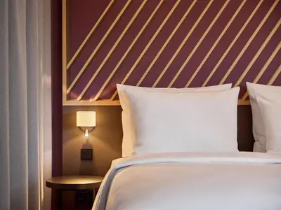 Ein Bett oder Betten in einem Zimmer der Unterkunft B&B Hotel Duisburg Hbf-Süd