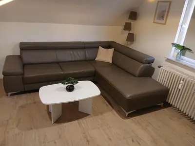 Ein Sitzbereich in der Unterkunft Blue sky apartment