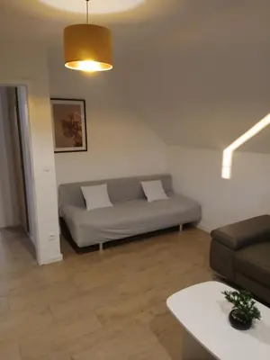 Ein Sitzbereich in der Unterkunft Blue sky apartment
