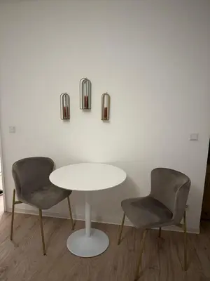 Ein Sitzbereich in der Unterkunft Cozy City Apartment
