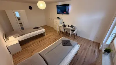 TV/Unterhaltungsangebot in der Unterkunft GNA02 - Zeitgemäße Apartments mit modernen Küchen, Balkon & Parkplatz